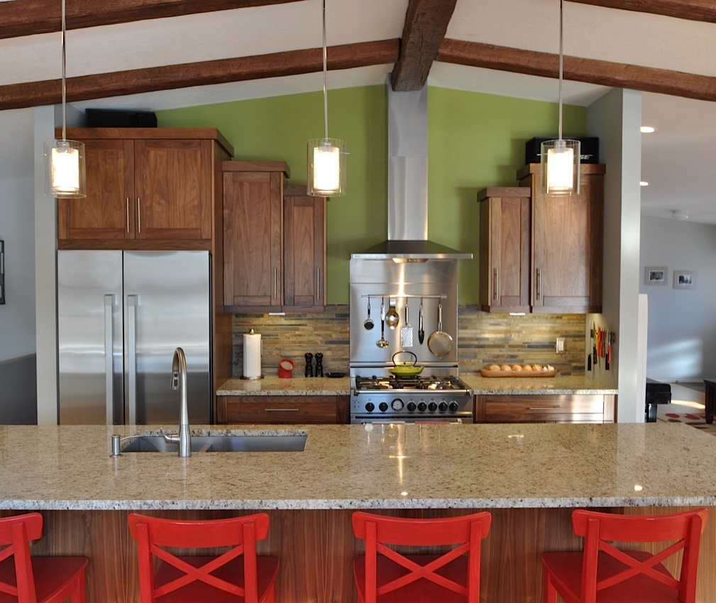 Modern rustic kitchen with beautiful complimentary colour scheme and stunning walnut cabinetry